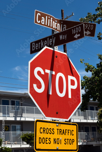 Photo of the street signs at the intersection of Berkeley Way & California Street in Berkeley, California — two metal street blades mounted on a pole, shown from a low/angled perspective against sky.