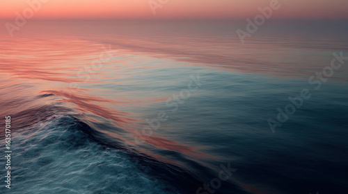 capture breathtaking aerial view of ocean surface during sunset highlighting ultrabright reflections of sun dancing