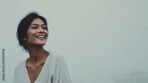 ultraminimalist portrait joyful smile against clean background radiating bali vibes