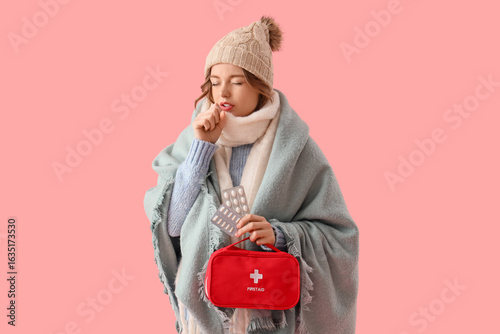 Sick young woman with first...
