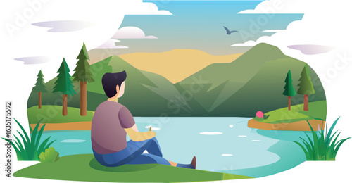 Man sitting on grass by a lake, gazing at mountains and a clear sky.