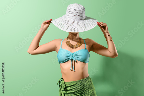 Beautiful young woman in st...