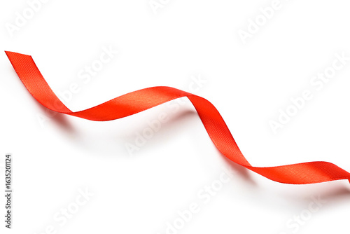Wavy red satin ribbon on wh...