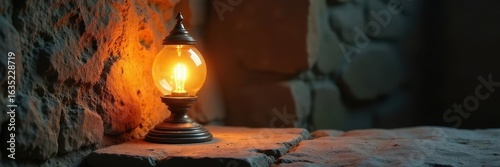 Elegant vintage lamp casts warm glow on ancient stone, warm light, Europe, historic