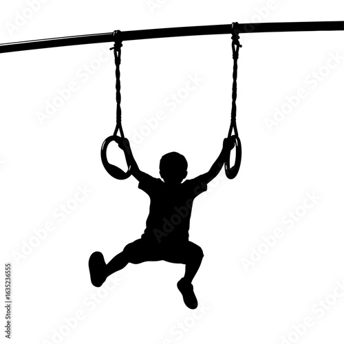 Silhouette of a boy hanging from gymnastic rings attached to a horizontal bar outdoors in action