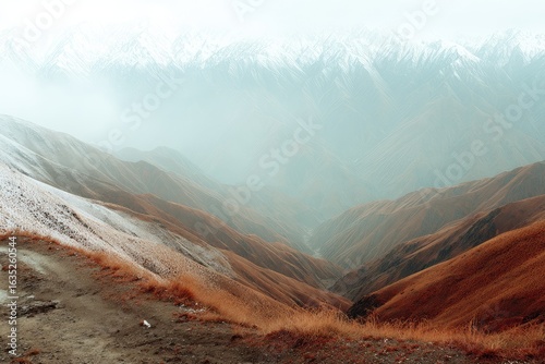 Mountain vista, autumnal hues, misty peaks