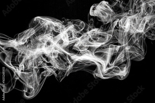 Abstract smoky white shapes against black background