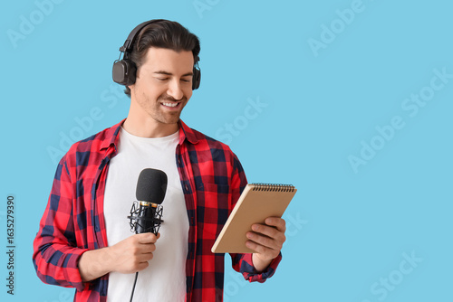Male radio presenter with n...