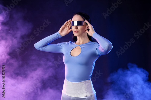 Young woman in futuristic c...