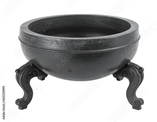Elegant antique cast iron cauldron with ornate legs, perfect for rustic decor and themed events.