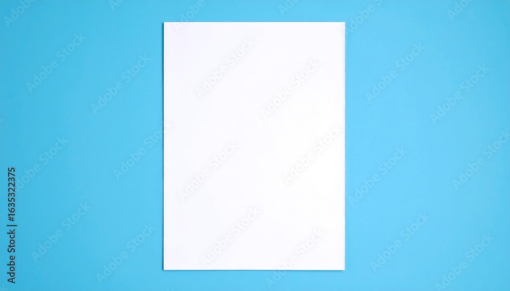 Blank white sheet of paper on a vibrant blue background Blank white sheet of paper on a vibrant blue background