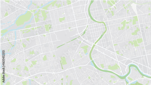 Vector aerial view of a city map featuring a winding river, parks, and a grid of streets and roads layout
