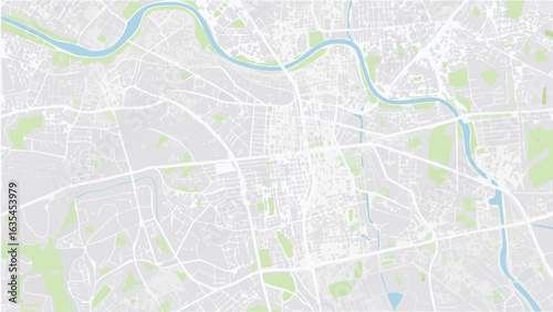 Vector aerial depiction of a city map featuring roads rivers and green spaces in a muted color palette
