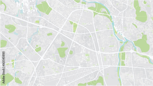 Vector aerial view of a city map with roads parks and a river system in a light color palette and minimal details
