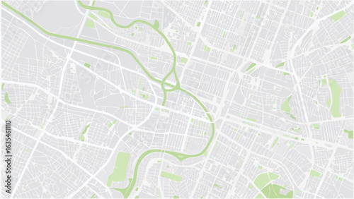 Vector aerial view of city map featuring roads rivers and green spaces in a light color palette design style