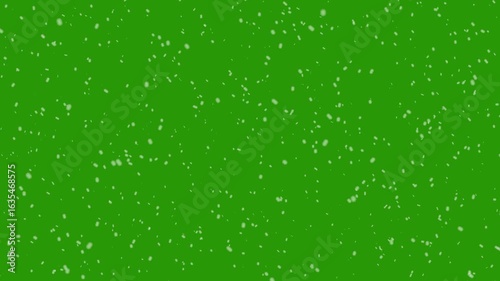 Falling snow loopable- Realistic snow fall seamless loop animation on green screen background. Snowflakes falling against across a green sky. Snowfall overlay- Snow isolated chroma key. Flakes to down