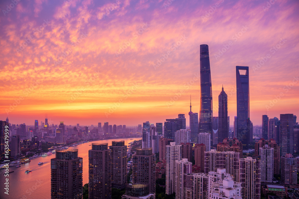 Fototapeta premium Overlooking Shanghai Lujiazui skyscrapers at golden dusk