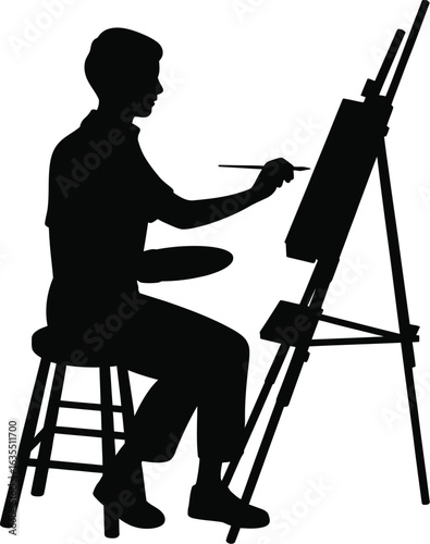 Artist painting on easel brush palette
