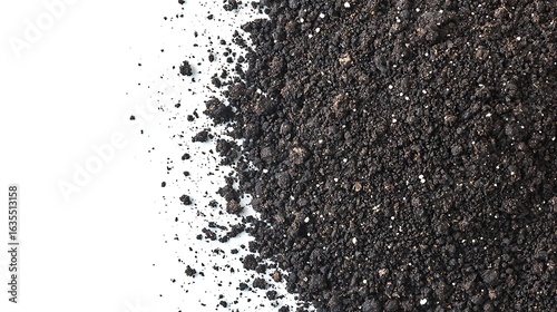 Close-up of potting soil with visible organic matter on white background, shot with 24-135mm zoom lens, focus on rich texture and moisture detail