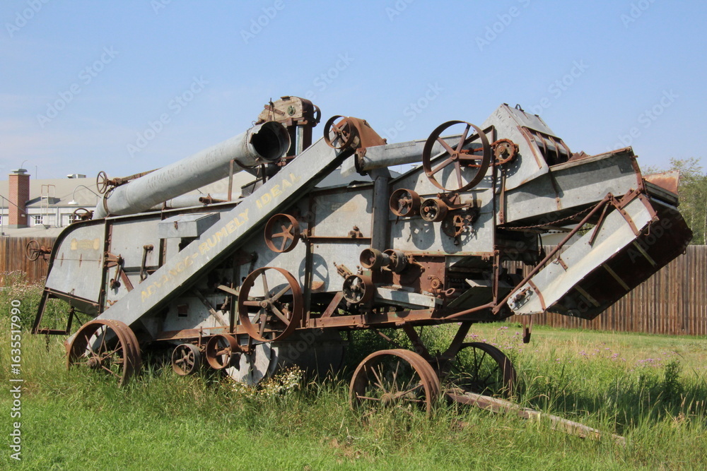 Fototapeta premium old farm tractor in field