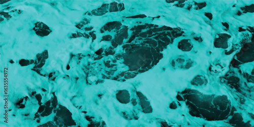 Abstract oceanic surface in teal capturing fluid textures of sea foam and rock formations in a monochromatic artwork