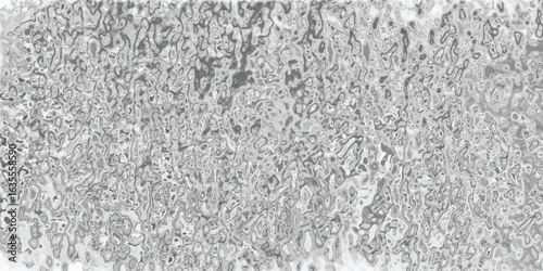 Abstract grayscale texture of organic shapes resembling a natural landscape or artistic fluidity for backgrounds and designs.