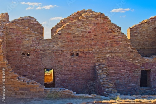 Part of Chaco Canyon Pueblo with the sky and clouds in the background, New Mexico.
