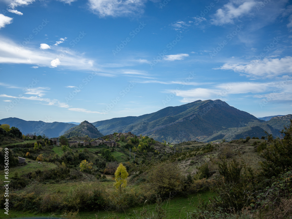 Obraz premium Mountain landscape with clouds