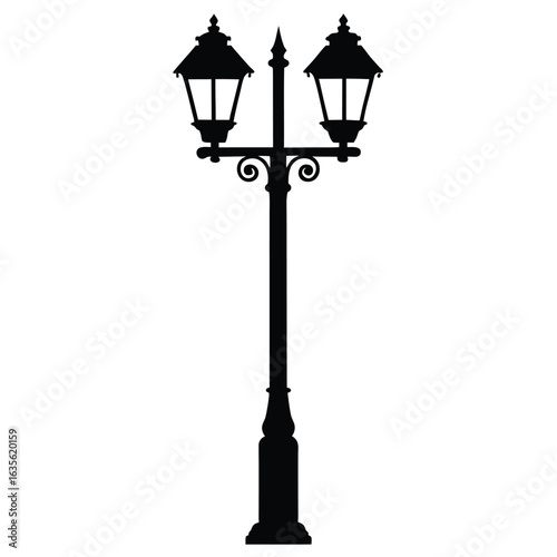 Silhouette of Ornate Two Lamp Street Light with Scrollwork Detail