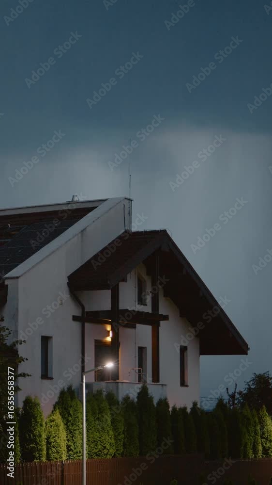custom made wallpaper toronto digitalVertical Screen: Dark clouds gather above the house while rain starts to fall, accompanied by flashes of lightning and distant thunder, creating an intense storm atmosphere.