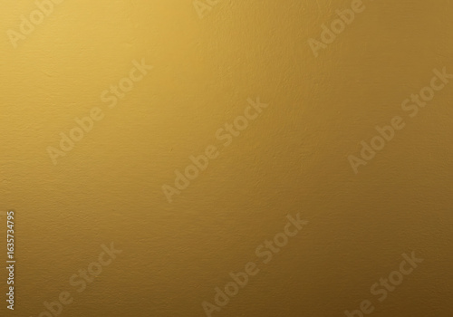 Abstract gold foil texture with a subtle lighting effect. A premium and elegant metallic sheet background for sophisticated design projects.