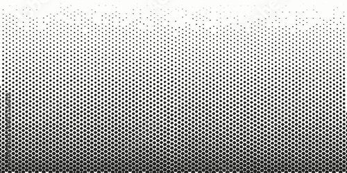 Black dots fading into white background with a gradient effect