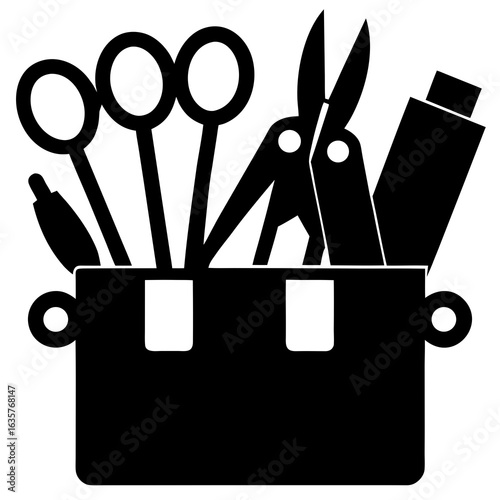 Black silhouette of crafting tools in a container scissors
