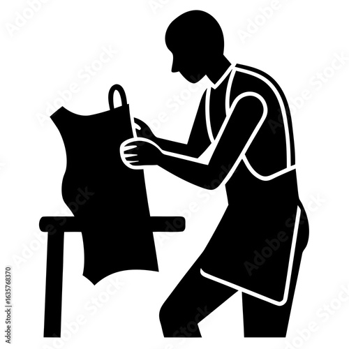 Craftsman working with leather crafting artisan