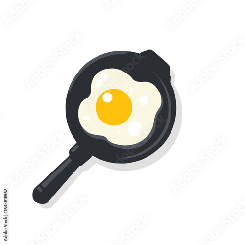 Cooking an egg in a frying pan on a clean white background for a simple meal preparation
