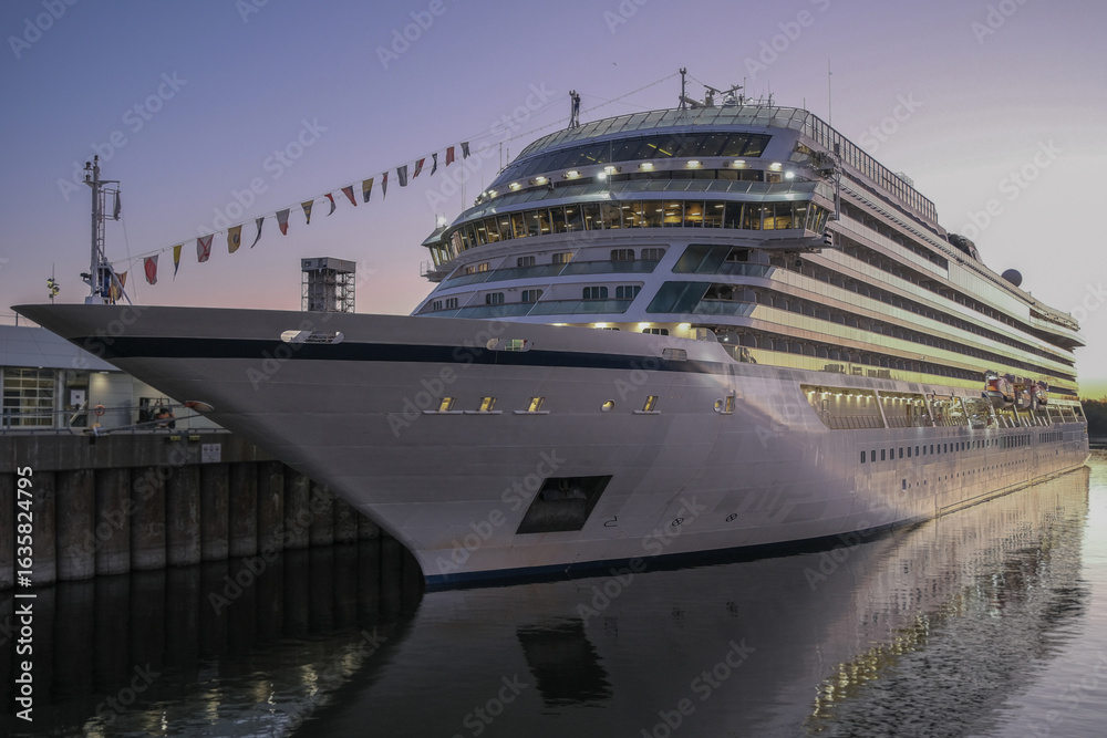 Naklejka premium All inclusive luxury yacht cruiseship cruise ship liner Star docked in port St. Lawrence River in Montreal, Quebec Canada during New England Indian Summer cruising