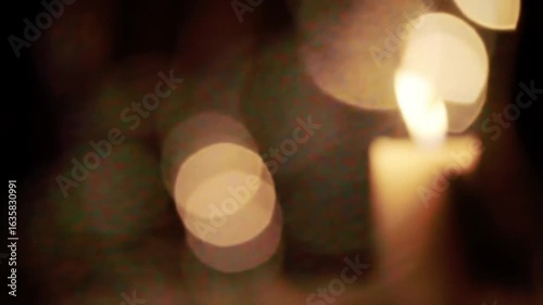 Candle light in dark interior