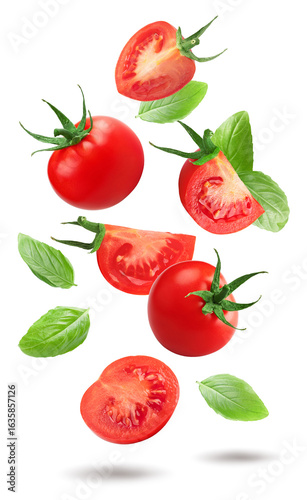 Wallpaper Mural fresh tomatoes with basil isolated on white background. clipping path Torontodigital.ca