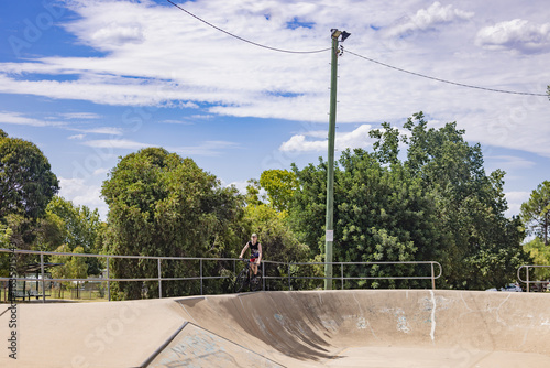 Wallpaper Mural Teen boy riding mountain bike at skate park Torontodigital.ca