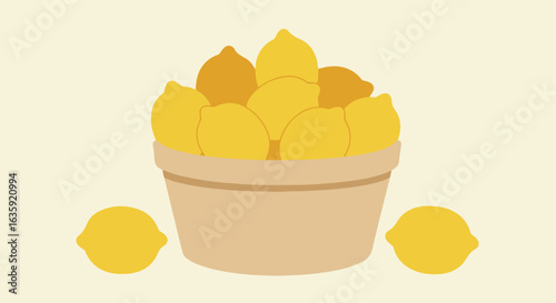 Lemons overflowing from a tan pot, two lemons sit on each side of the pot