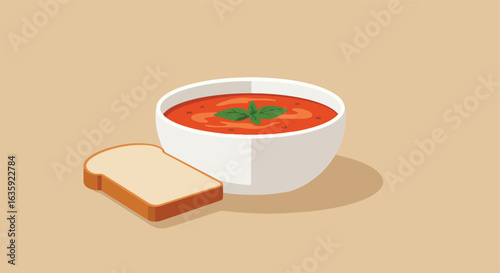 Tasty tomato soup in a bowl with fresh basil, served with bread. Beige background
