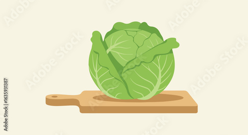 Fresh green cabbage rests atop a wooden cutting board; flat style