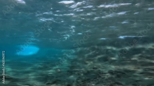 Wallpaper Mural Underwater view of a light-filled cavern or opening in the ocean floor. Torontodigital.ca