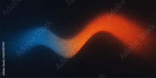Orange flame and red glow from the sun light up the night sky over mountains