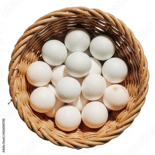 Wallpaper Mural Basket of Fresh Eggs: A rustic basket overflowing with a dozen pristine white eggs, a simple symbol of natural nourishment and culinary delight. Torontodigital.ca
