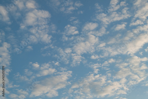 Cloudy sky background. texture of clouds and blue sky. Photo of the real sky