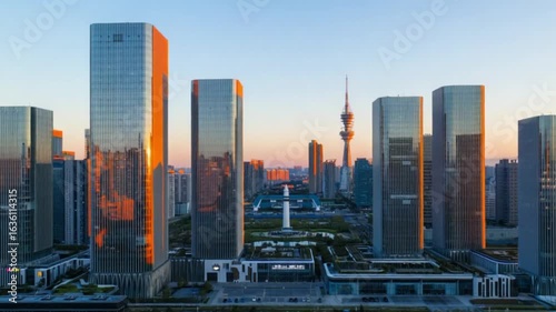 Detailed High Resolution Cityscape with Modern Skyscrapers and Towering Futuristic Buildings at Glowing Sunset — 4K HD Video Footage Download, Cinematic Urban Panorama