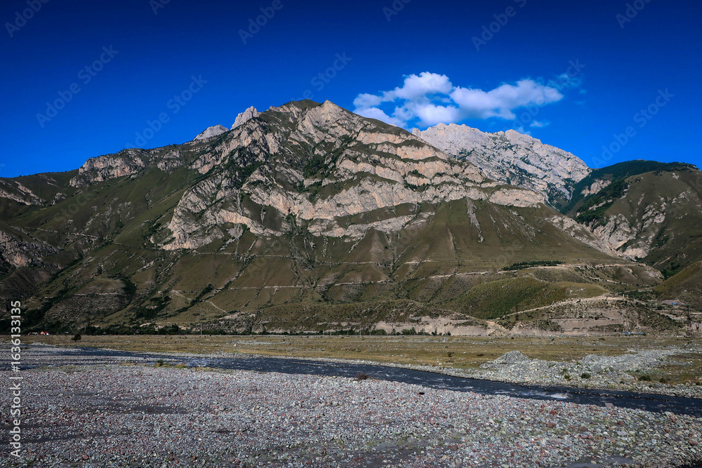 Fototapeta premium Landscape with mountains and Terek river in Ingushetia, Russia