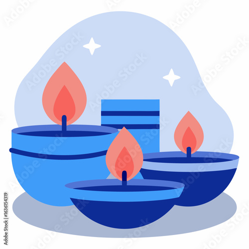 Blue clay lamps with flames in a serene decorative arrangement  