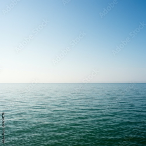Calm Ocean Horizon Under a Clear Blue Sky